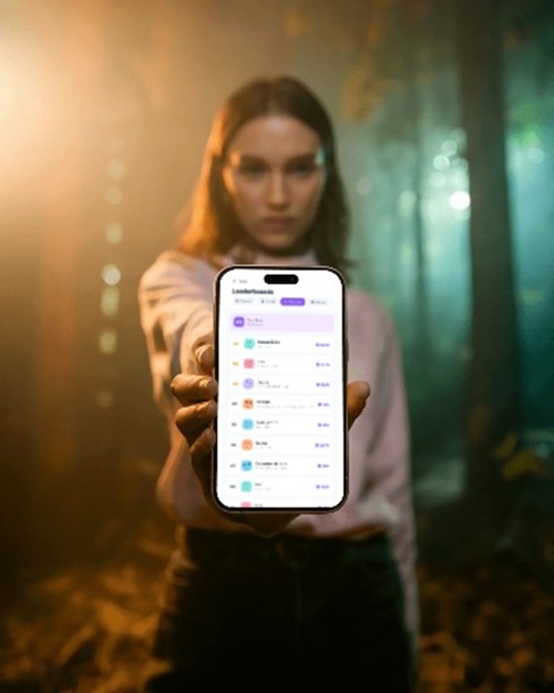 MathQuest leaderboard screen displayed on a phone held toward the camera